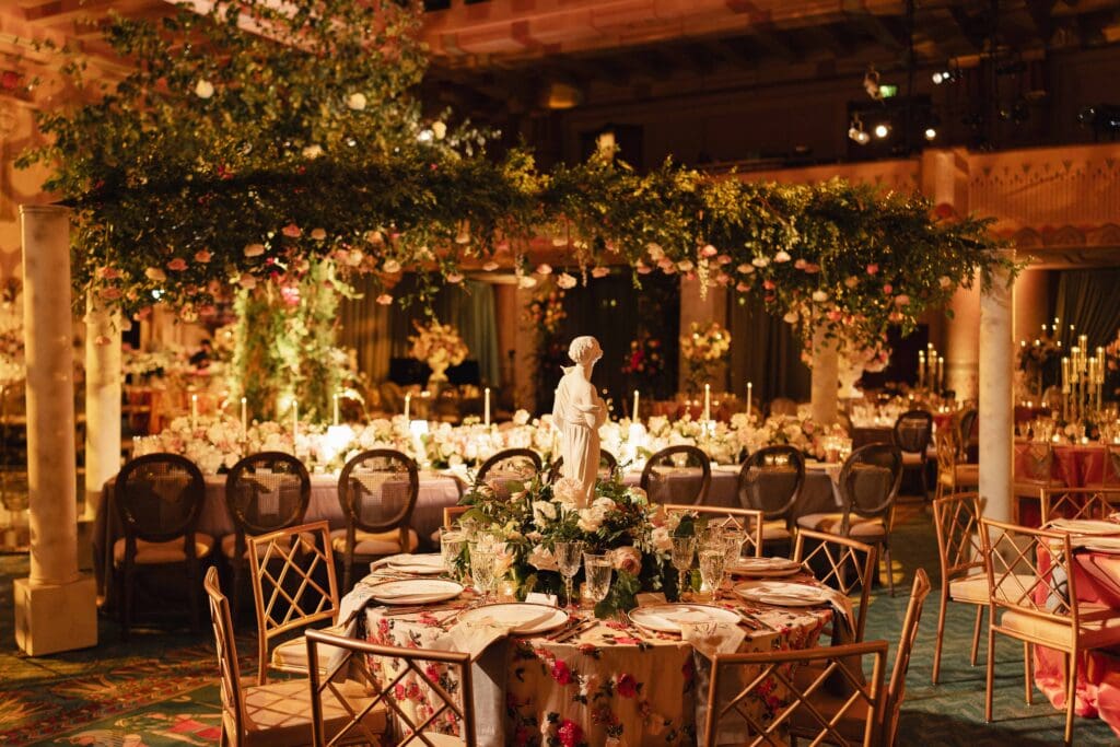 Fox Theatre in Atlanta, GA guest tables with elevated beaded linens and floral canopy guest estate tables